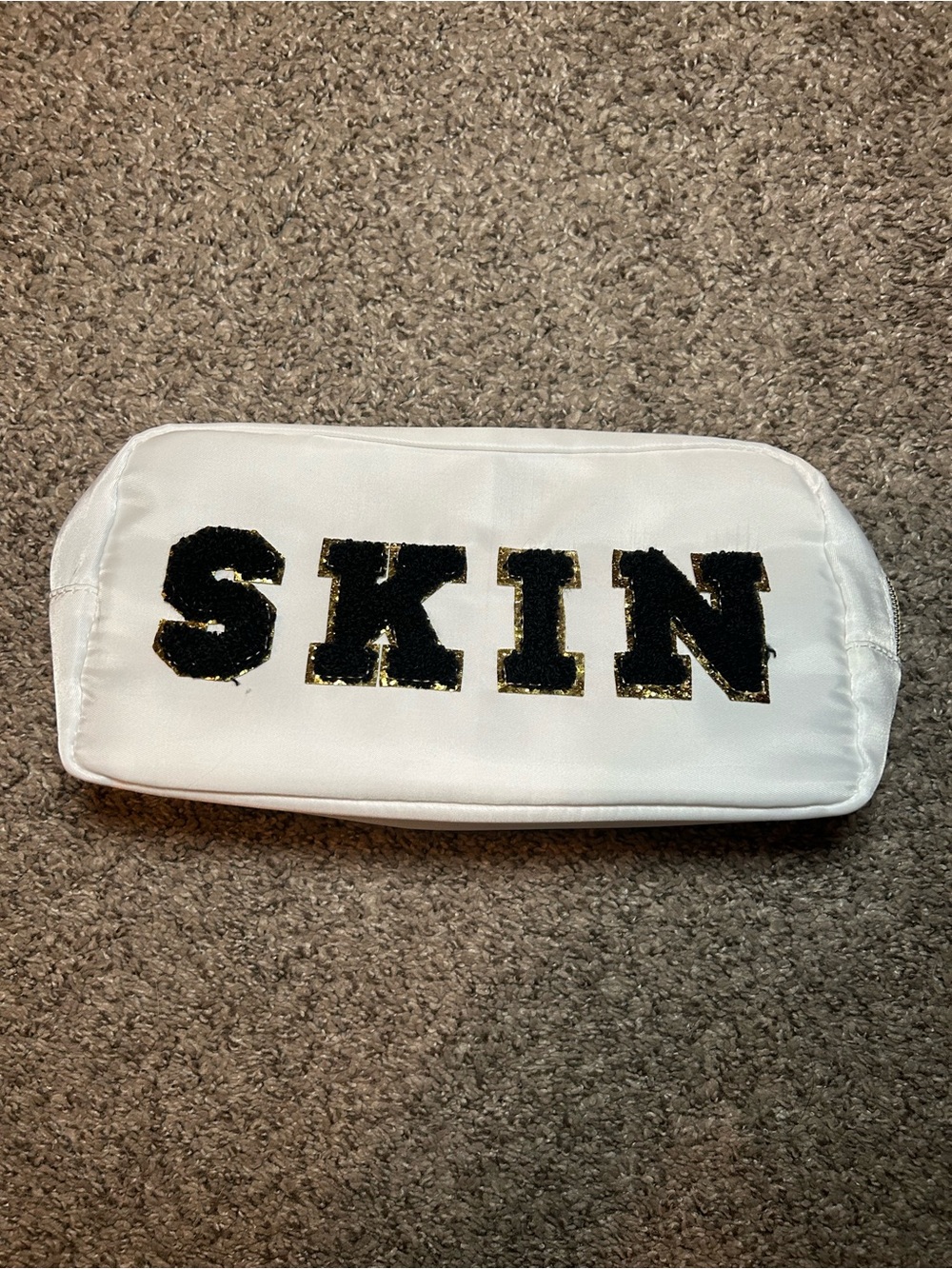 SKIN Care Pouch with Black Lettering